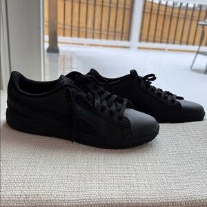 Puma women’s All-Black Sneakers